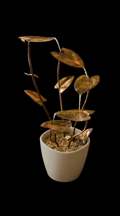 image with small tabletop fountain made in Leaves shapes from copper